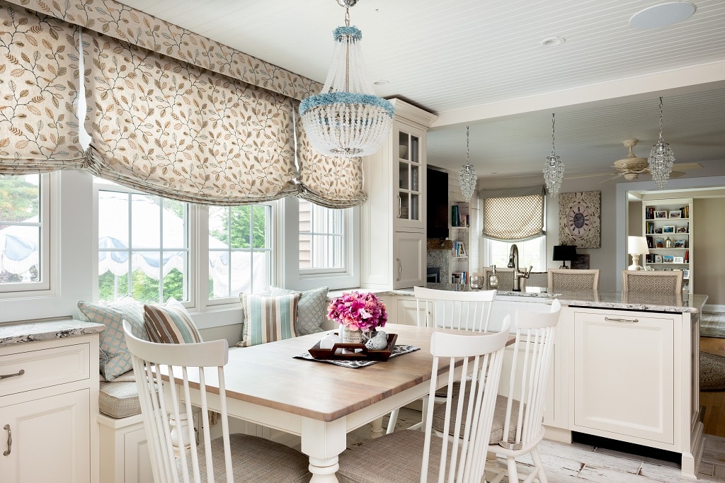 Beach House Chic White Kitchen Featuring Nina Green Signature Series Cabinetry Breakfast Nook & Sink